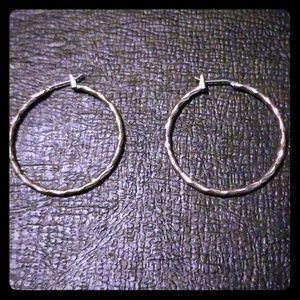 Medium size silver shiny hoop earrings